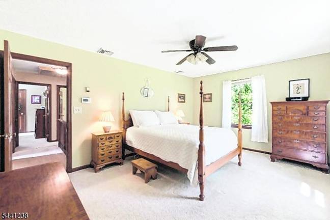 Sparta colonial features classic den, outdoor oasis