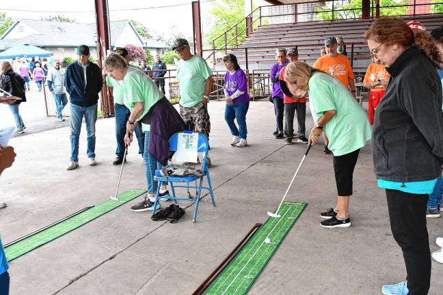 <b>Participants compete in Golf Putt at the Sussex County Senior Olympics on June 17 at the fairgrounds in Augusta. (Photos by Maria Kovic)</b>
