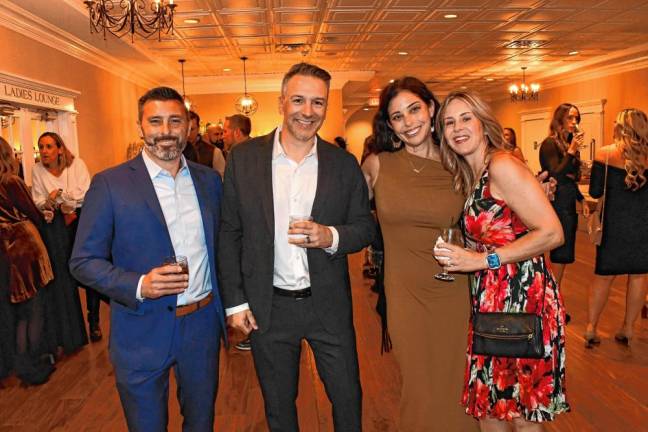 Steve DiRenzo, Rick Bruno, Amy DiRenzo ans Jodi Bruno, all of Sparta.
