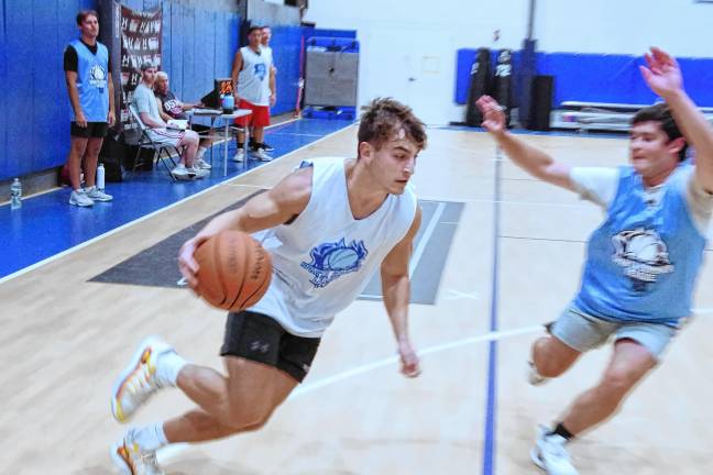 Team Smalley's Matt Moran handles the ball. He is a graduate of Jefferson Township High School.