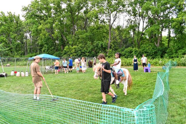 Children’s activities include pony rides.