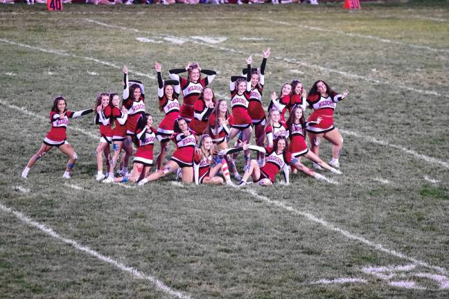 <b>The High Point Regional High School cheerleaders perform during halftime.</b>
