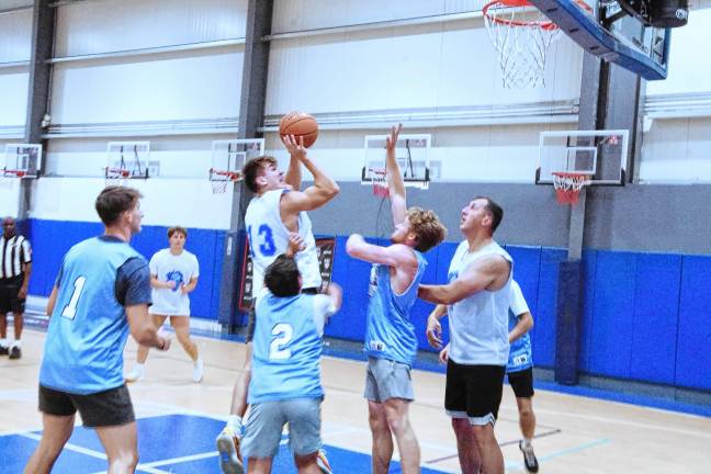 SB4 Team Smalley defeats Team Maresca, 68-53, on July 10.