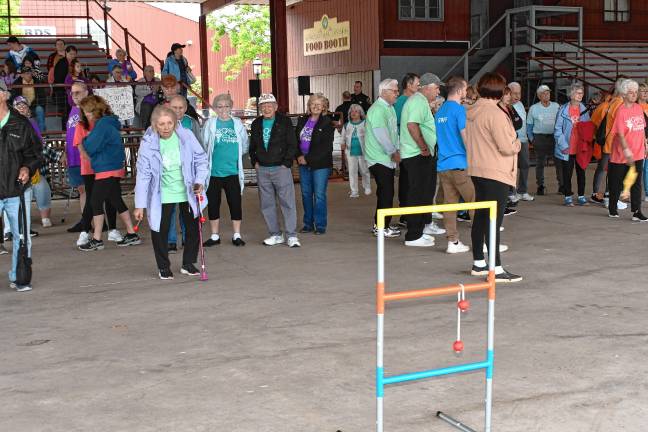 <b>Participants compete in the Ladder Toss.</b>