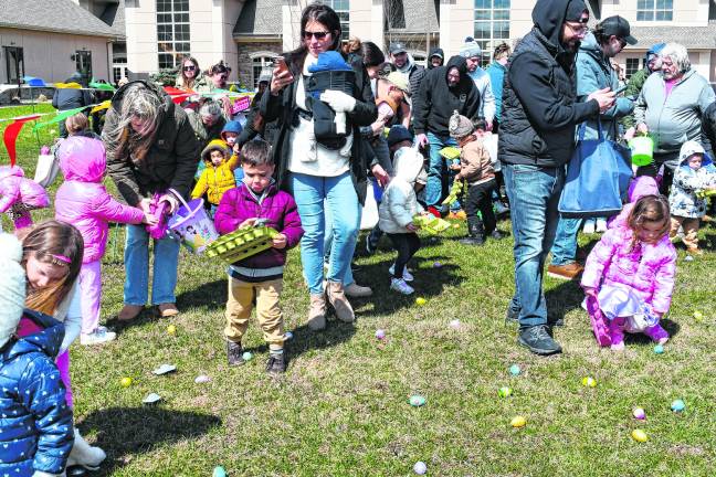 Children hunt for Easter eggs.