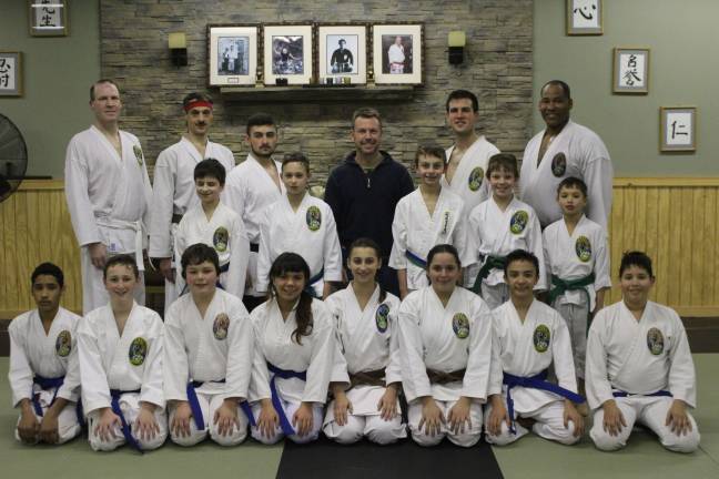 East West Students celebrate with Sensei Klinger following the conclusion of the seminar.