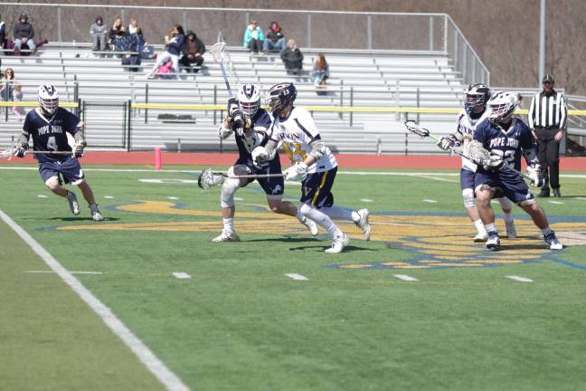 Vernon's Kevin Parisi (13) carries the ball. Parisi made two assists and picked up eight ground balls.