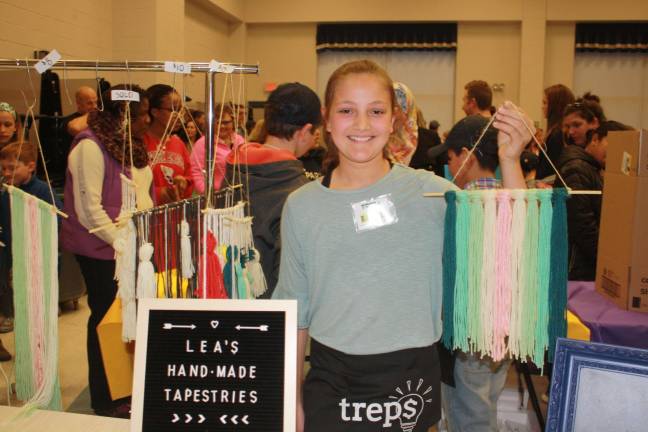 Lea Tsamadias' Hand-Made Tapestries adds a decorative touch at the Marketplace