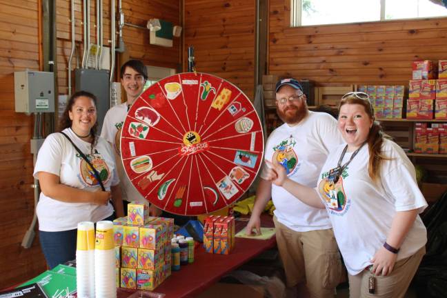 ShopRite associates showcase the wheel, where every child is a winner, no matter what the outcome