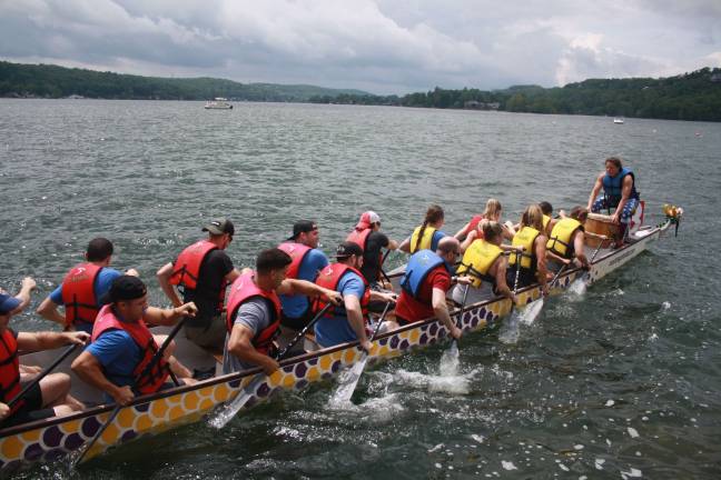 First time competitors Cross fit Skylands take to the water.