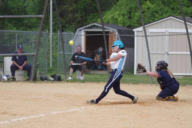 Tatiana Esteva-Ingram connects in the seventh inning.