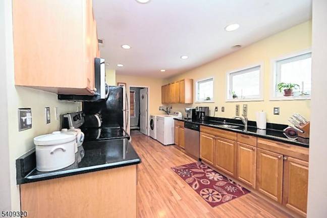 Lake Mohawk home as bright and inviting layout