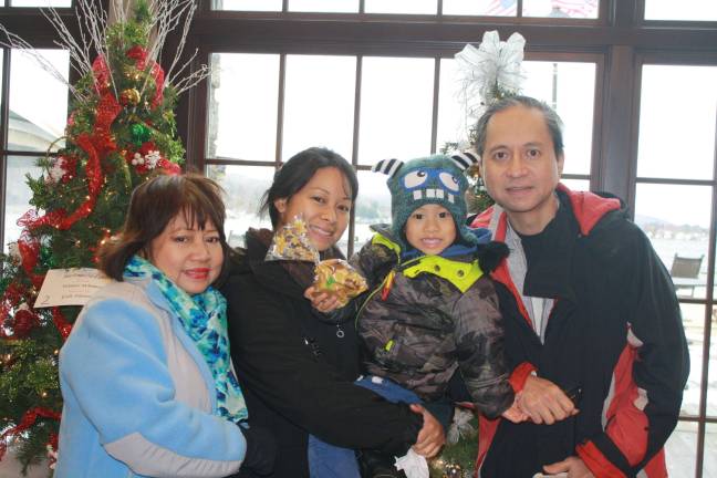 Three-year old Jax Eusebio and his family came all the way from Clifton to enjoy the Festival of Trees event at Lake Mohawk Country Club. Photo by Rose Sgarlato