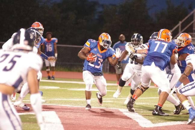 Gators ball carrier Daryl Shuler on the move in the first half.