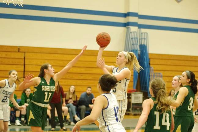 Kittatinny's Olivia Redden shoots as Sussex Tech's Brooke Munoz reaches out to block. Redden scored two points.