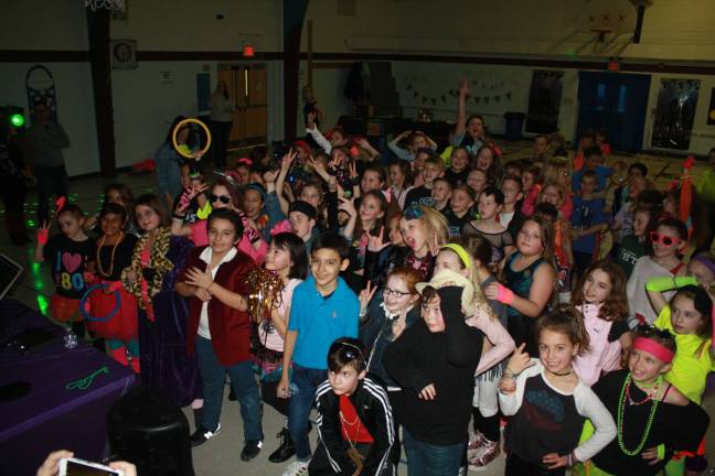 Fourth graders at Helen Morgan Elementary School enjoyed celebrating the 80's last Friday night.