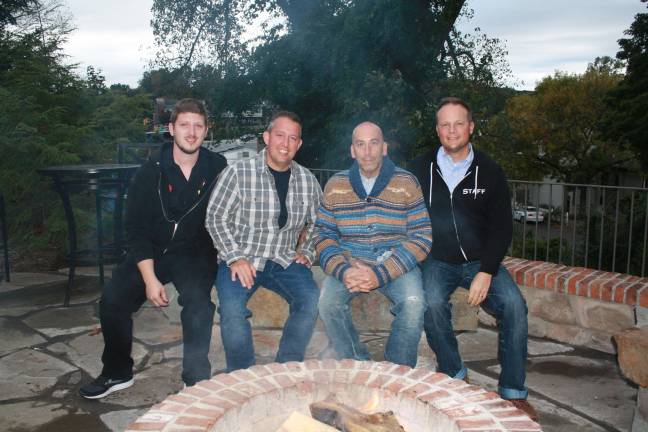 At last year's Oktoberfest, from left: Ricky Soni of Mohawk House, Sparta Police Cpl. Kurt Morris, Steve Scro, owner of Mohawk House and Sparta Chief of Police Neil Spidaletto. Photo by Rose Sgharlato