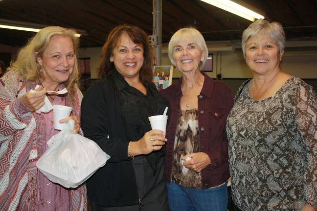 From left, Lillian Farrell. Mary Hilgart, Mary Stanek and Nina Booth, friends and choir members of Saint Kateri Parish, enjoy a ladies night out.