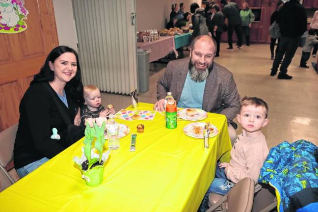 Raphaela and James Wiltz of Sparta have breakfast with their sons Phil, 1, and Max, 3.