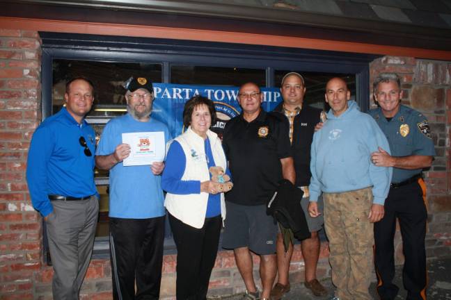 From left, Sparta Police Chief Neil Spidaletto, Bob Chubb of Code 9, Marjorie Strohsal of NAMI, Pete Litchfield and John Finkeldie of Sparta VFW, Steve Scro of Moahwk House and Lieut. John Lamom of Sparta PD.