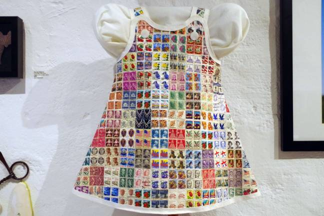 'Childs Sundress' created by artist Audrey Yankielun made of hand-stitched postage stamps.