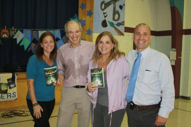From left, Helen Morgan School Media Specialist Stephanie Bernardo with Author Peter Lerengis, Sparta Books Mindy Kemper and Doug Layman, Principal of Helen Morgan. Photos by Rose Sgarlato