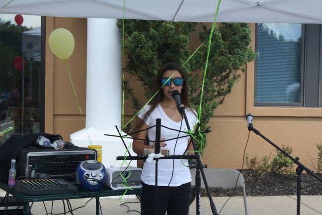 Twelve-year-old Audrey Sacks, of Lafayette, entertains the crowd. photos by rose sgarlato