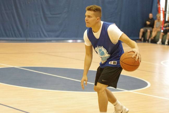 Team Synol's Frankie Rios socred a game-high 25 points. Rios is a graduate of Newton High School.