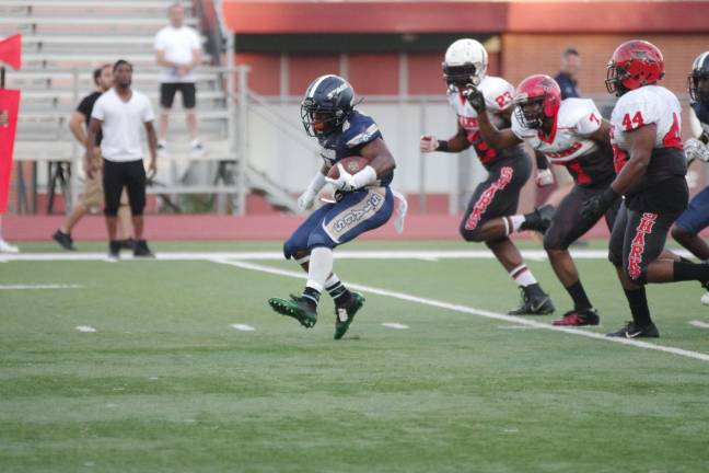 Stags Mack advances the ball to the open field in the first half.