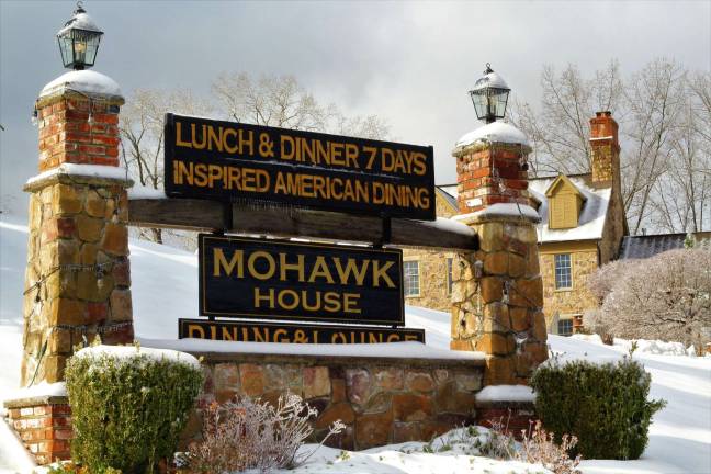 The Mohawk House sign is flanked by icycles and snow capped bushes after Saturday's storm. (Photos by Shannon Kuratli).