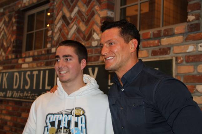 Senior Teddy Fisher and Steve Weatherford.