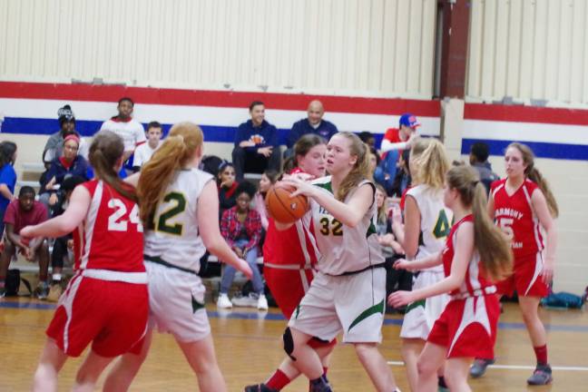 Veritas Christian's Jane Valkema holds the ball. Valkema grabbed nine rebounds.