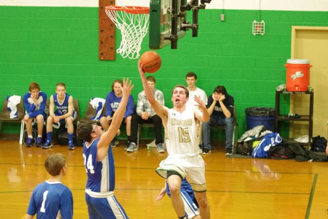 Sussex Tech's Paul LiTrenta takes the ball to the hoop in the second period. LiTrenta scored four points.