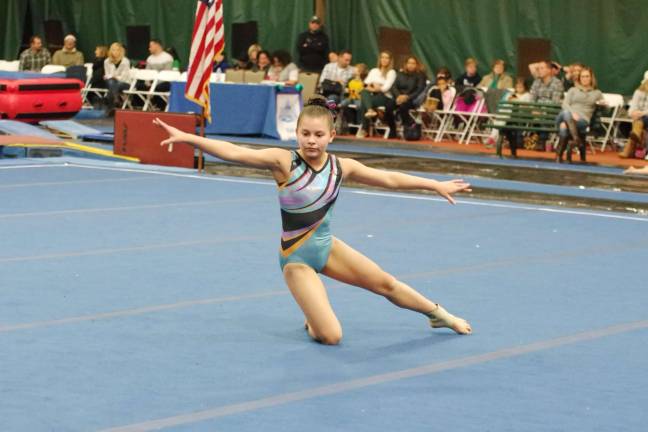 Westys gymnast Samie Copley performs during a floor routine. Copley who resides in Vernon, New Jersey took second place in the Silver 9-11 division with an all around score of 34.85.