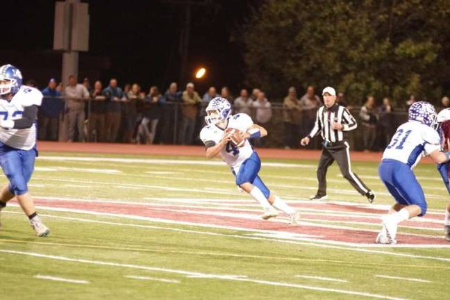 Kittatinny quarterback James Franco carries the ball in the first half. Franco threw for 112 total yards and he rushed for 65 yards.