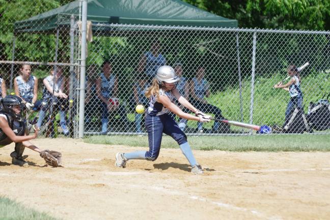 A swing and a miss for Sparta batter Renee Breuninger.