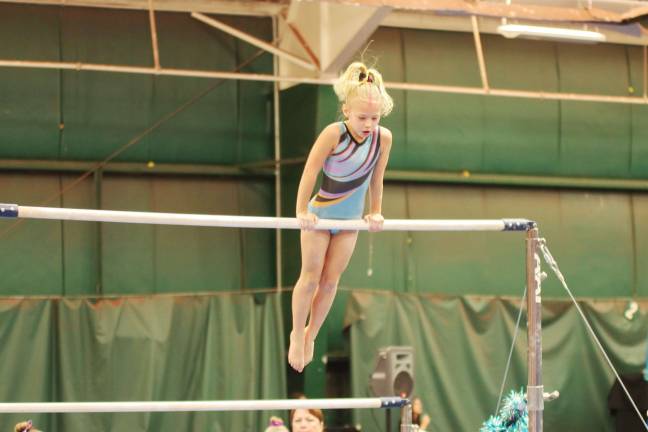 Westys gymnast Hailey Jenkins on the uneven bars. Jenkins from Lafayette, New Jersey took first place in the Bronze 6-7 division with an all around score of 33.70.