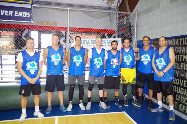 Team Synol from left Frankie Rios, Josh Funk, Craig Tomkins, Mike DeLorenzo, Vinny Synol, Eric Whitman, Brandon Zaleski and Randy Jackson.