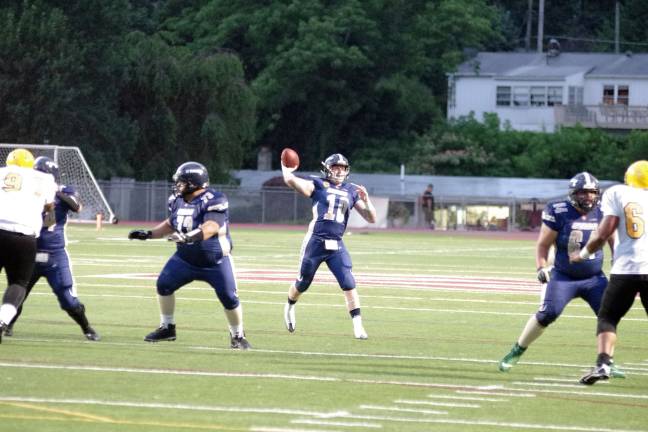 Sussex Stags quarterback Jimmy Lahue l;ets it fly in the second quarter.