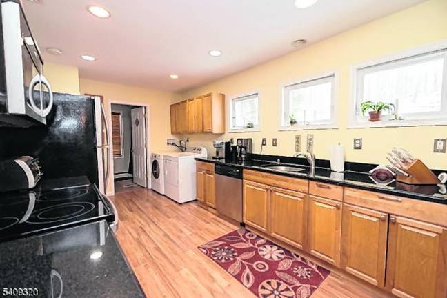 Lake Mohawk home as bright and inviting layout