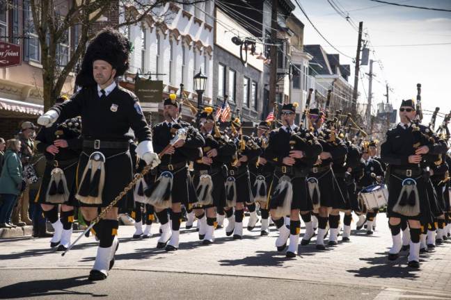Members of the Police Pipes and Drums of Morris County march in the St. Patrick’s Day Parade on March 18 in Newton. (Photos by John Hester)
