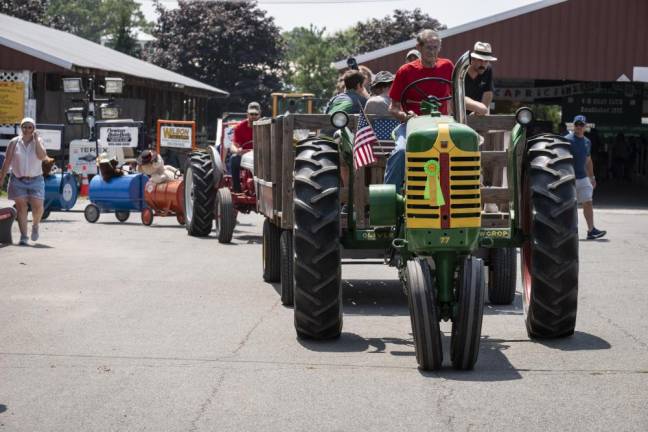 FR28 A tractor parade sets off at the New Jersey State Fair. (Photo by John Hester)