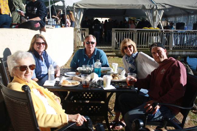 A family affair and private table off the beach for Doris Personett, Mary Andrews, Ed Andrews, Renee Panten and Michael Panten.