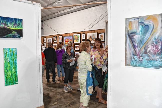 <b>Ann Smiga Greene was the featured artist at the Meet the Artists reception. She teaches adult watercolor classes at Kittatinny Regional High School and in her home studio.</b>