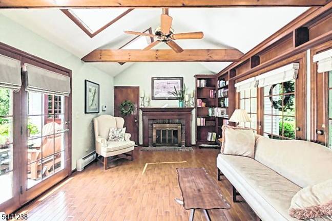Sparta colonial features classic den, outdoor oasis