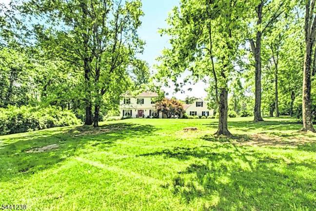 Sparta colonial features classic den, outdoor oasis