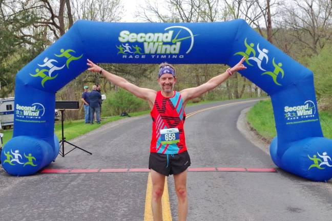 5K runner Stefan Albinson of Layton, New Jersey finished in first place overall with a time of 22:04.91.