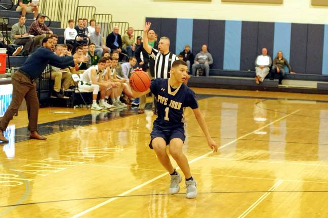 Pope John's DiAndre South handles the ball during the fourth period.