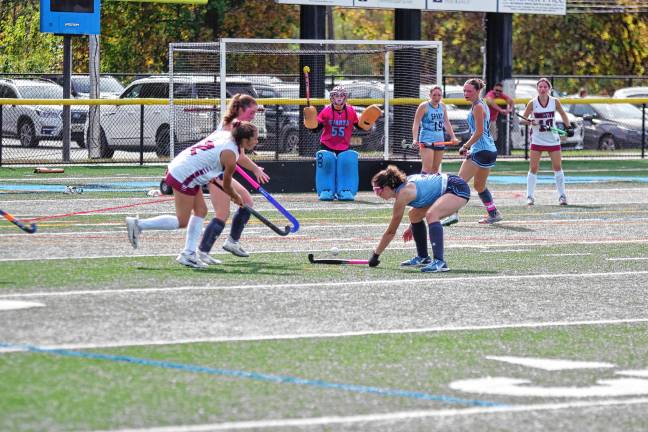 Sparta goalie Kaitlyn Rodriguez (55) stands guard in front of the goal post. She made eight saves.