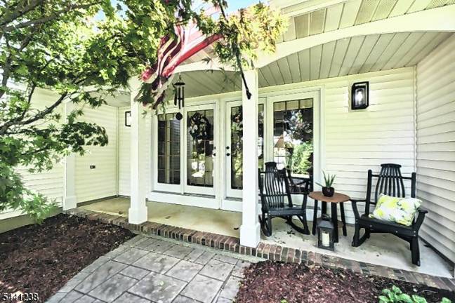 Sparta colonial features classic den, outdoor oasis
